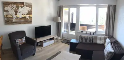 Ein Sitzbereich in der Unterkunft Choucas A16