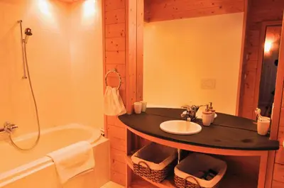 Ein Badezimmer in der Unterkunft Chalet E Toue