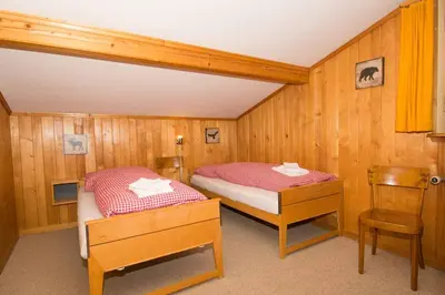 Ein Bett oder Betten in einem Zimmer der Unterkunft Buchhüttli