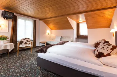 Ein Bett oder Betten in einem Zimmer der Unterkunft Hotel Oberland