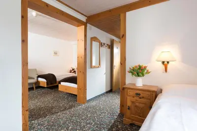 Ein Bett oder Betten in einem Zimmer der Unterkunft Hotel Oberland