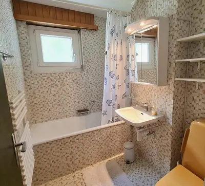 Ein Badezimmer in der Unterkunft Lorée 201