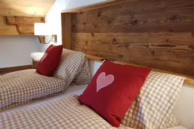Ein Bett oder Betten in einem Zimmer der Unterkunft Guggerzyt