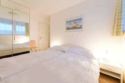 Ein Bett oder Betten in einem Zimmer der Unterkunft Apartment Topas