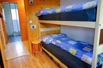 Ein Bett oder Betten in einem Zimmer der Unterkunft Chalet Fletschhorn