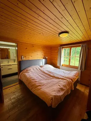 Ein Bett oder Betten in einem Zimmer der Unterkunft Chalet Berken
