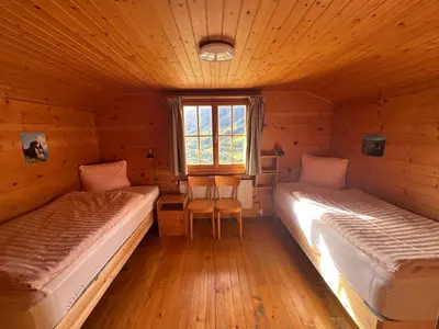 Ein Bett oder Betten in einem Zimmer der Unterkunft Chalet Berken