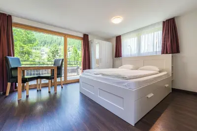 Ein Bett oder Betten in einem Zimmer der Unterkunft Apartment Dorfblick