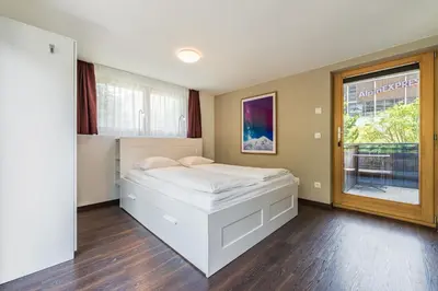 Ein Bett oder Betten in einem Zimmer der Unterkunft Apartment Dorfblick