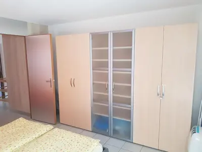 Ein Bett oder Betten in einem Zimmer der Unterkunft Ferienwohnung Zayetta Orange Cube Nr. 11a