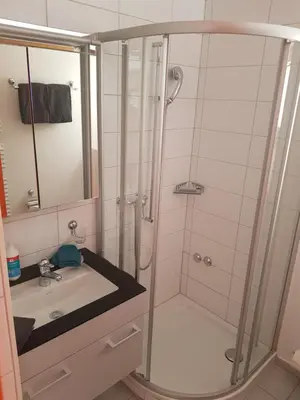 Ein Badezimmer in der Unterkunft Ferienwohnung Zayetta Orange Cube Nr. 11a