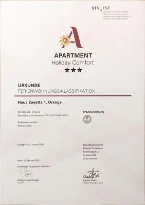 Ein Zertifikat, Auszeichnung, Logo oder anderes Dokument, das in der Unterkunft Ferienwohnung Zayetta Orange Cube Nr. 11a ausgestellt ist