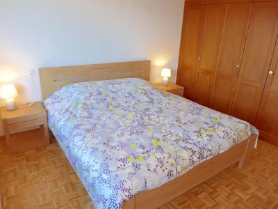 Ein Bett oder Betten in einem Zimmer der Unterkunft Apartment Grand-Large A 22 by Interhome