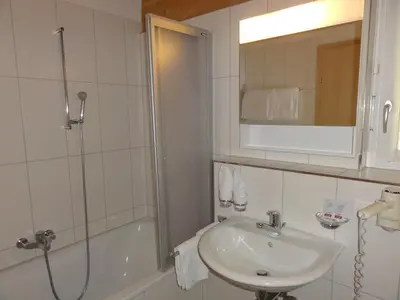 Ein Badezimmer in der Unterkunft Welcome Hotel Täsch by Täscherhof