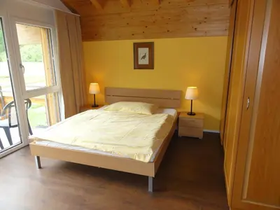 Ein Bett oder Betten in einem Zimmer der Unterkunft Welcome Hotel Täsch by Täscherhof