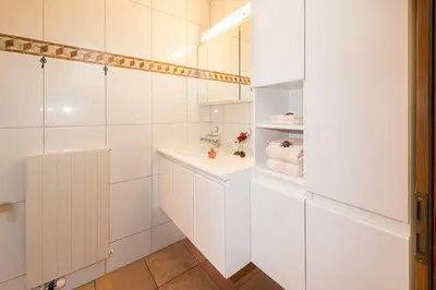 Ein Badezimmer in der Unterkunft Försterli West