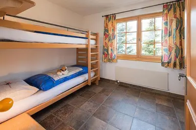 Ein Bett oder Betten in einem Zimmer der Unterkunft Försterli West