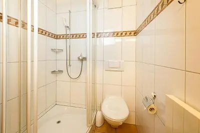 Ein Badezimmer in der Unterkunft Försterli West