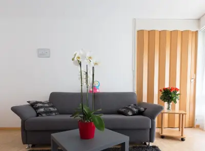 Ein Sitzbereich in der Unterkunft Haus Fortuna