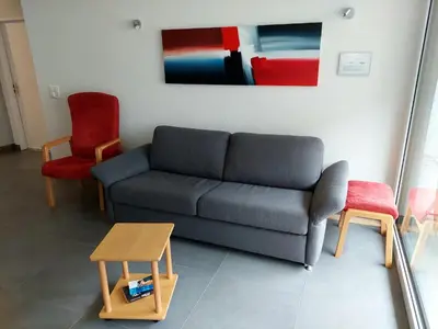 Ein Sitzbereich in der Unterkunft Haus Fortuna