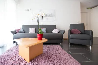Ein Sitzbereich in der Unterkunft Haus Fortuna