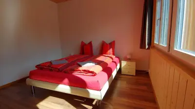 Ein Bett oder Betten in einem Zimmer der Unterkunft Ufem Egg Ferienwohnungen