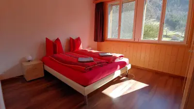 Ein Bett oder Betten in einem Zimmer der Unterkunft Ufem Egg Ferienwohnungen
