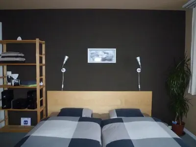 Ein Bett oder Betten in einem Zimmer der Unterkunft B&B Haussener