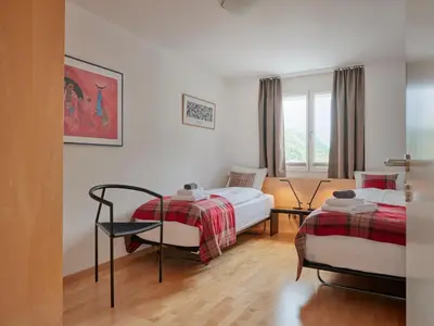 Ein Bett oder Betten in einem Zimmer der Unterkunft Ascot Penthouse 160 m2 Matterhorn View