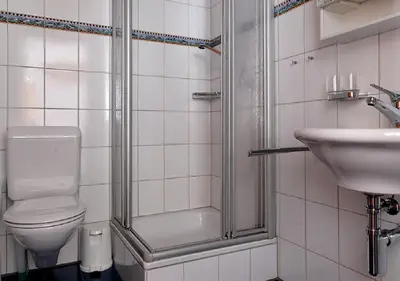Ein Badezimmer in der Unterkunft Studio Superior Brunnmatt