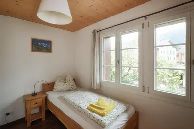 Ein Bett oder Betten in einem Zimmer der Unterkunft CityChalet