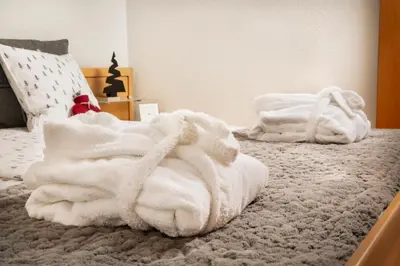 Ein Bett oder Betten in einem Zimmer der Unterkunft Panoram'Alp