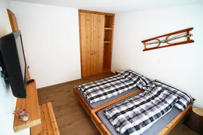 Ein Bett oder Betten in einem Zimmer der Unterkunft Amor Lodge