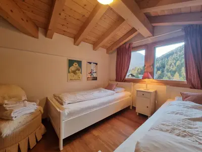 Ein Bett oder Betten in einem Zimmer der Unterkunft Haus Serac
