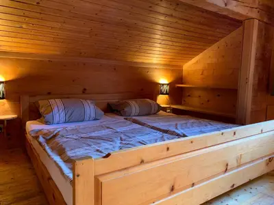 Ein Bett oder Betten in einem Zimmer der Unterkunft Chalet Victoria