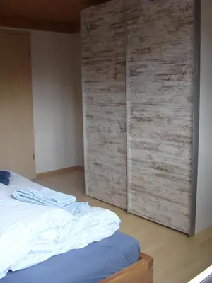 Ein Bett oder Betten in einem Zimmer der Unterkunft Chalet Sunnegg