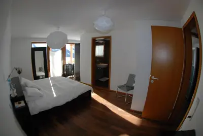 Ein Bett oder Betten in einem Zimmer der Unterkunft Ayoba