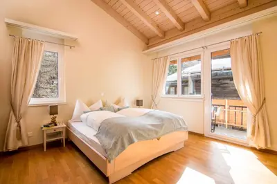 Ein Bett oder Betten in einem Zimmer der Unterkunft Chalet Sunshine