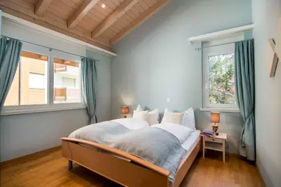 Ein Bett oder Betten in einem Zimmer der Unterkunft Chalet Sunshine