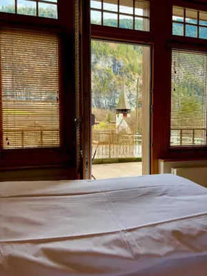 Ein Bett oder Betten in einem Zimmer der Unterkunft Chalet Rosa B&B