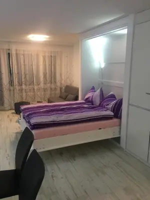 Ein Bett oder Betten in einem Zimmer der Unterkunft Holiday 87