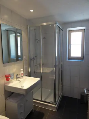 Ein Badezimmer in der Unterkunft Chalet Schönbühl