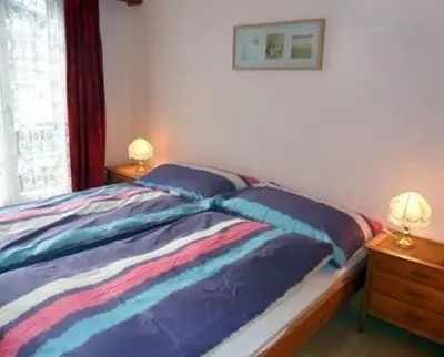 Ein Bett oder Betten in einem Zimmer der Unterkunft Pfaffenstöckli