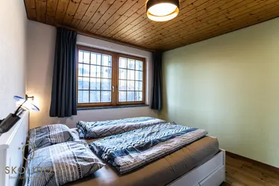 Ein Bett oder Betten in einem Zimmer der Unterkunft 2-Zimmerwohnung an zentraler Lage/Ski-in, Ski-out