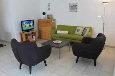 Ein Sitzbereich in der Unterkunft Haus Mondelli
