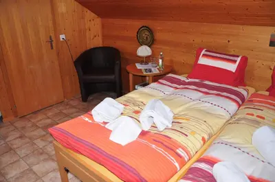 Ein Bett oder Betten in einem Zimmer der Unterkunft Chalet Allmegrat