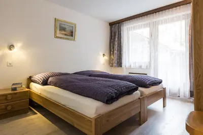 Ein Bett oder Betten in einem Zimmer der Unterkunft Haus Adora