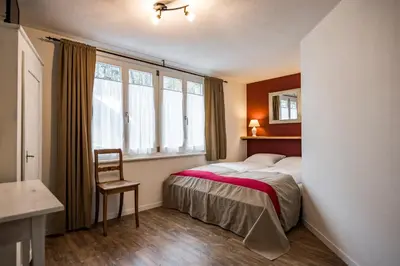 Ein Bett oder Betten in einem Zimmer der Unterkunft B3 Boutique-Bed&Breakfast