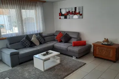 Ein Sitzbereich in der Unterkunft Aquarell Apartments
