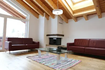 Ein Sitzbereich in der Unterkunft Bolero 4.5 Dachzimmerwohnung